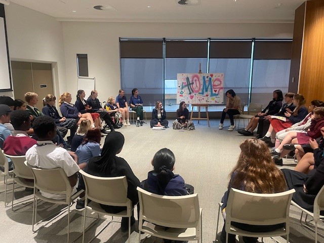 students discussing homelessness